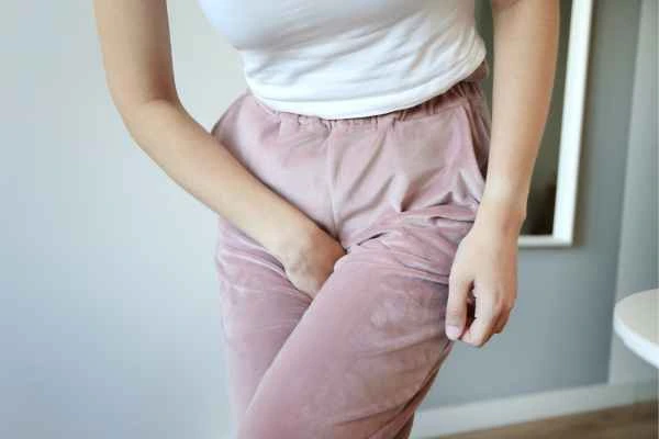 woman running for the toilet because of urinary incontinence Leigh-on-Sea